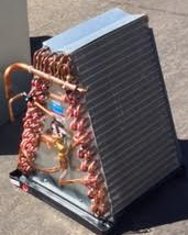 Evaporator coil sitting on cement ground