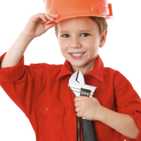 Kid wearing red jumpsuit, an orange hard hat, holding a wrench