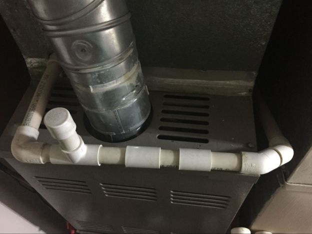 AC drain line connected to the indoor and outdoor units